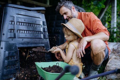 man and kid compost